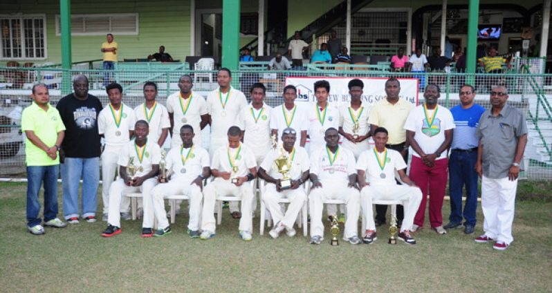 The victorious DCC team pose with trophy  and  NBS officials