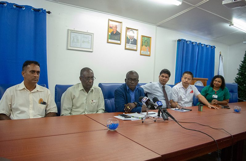 GPHC Chief Executive Officer (CEO) George Lewis (third left) and  Head of the Department of General Surgery Dr. Navindranauth Rambaran (at left of Lewis) with others at the press briefing on Tuesday (Delano Williams photo)