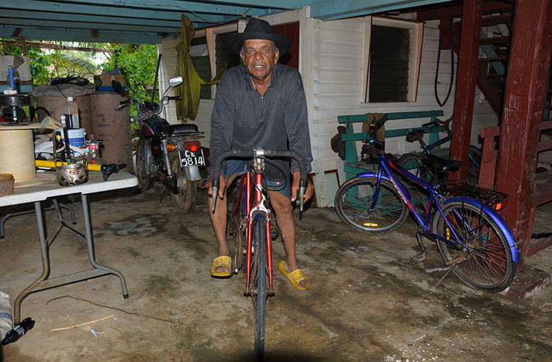 Lalta Persaud on his bicycle (Delano Williams photos)