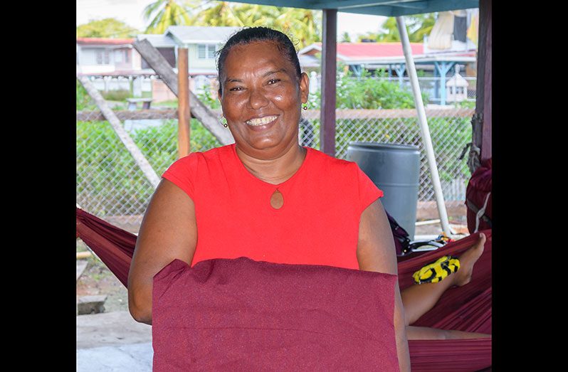 Sinda-Rita Chindersain displaying one of her home-made hammocks (Delano Williams photos)