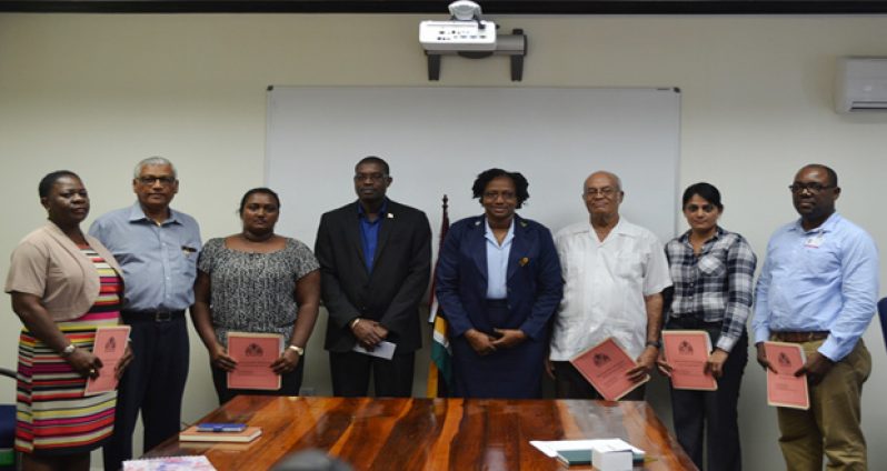Members of the new board pose with Minister of Public Infrastructure, David Patterson and Junior Minister within that ministry, Annette Ferguson