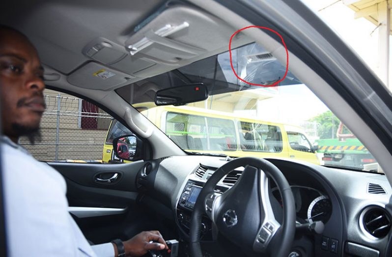 The RFID tag which is scanned by a machine placed above the toll booths
