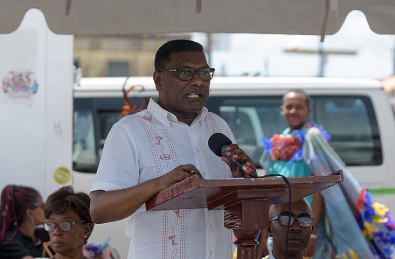 Chief Medical Officer (CMO) Dr. Shamdeo Persaud speaks at the Stabroek Market Square on Wednesday