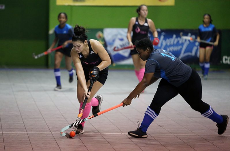 GBTI GCC and national striker Gabriella Xavier is challenged by Rene James of Saints.