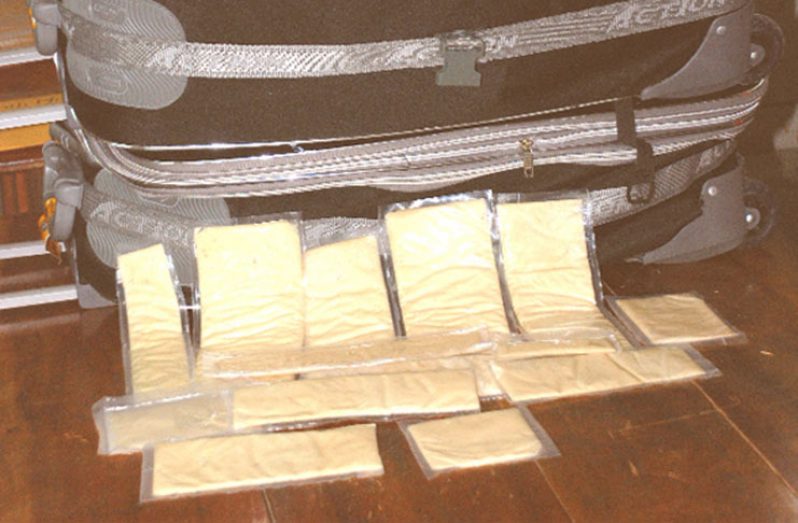 One of the many suitcases unearthed with drugs by the law enforcement authorities