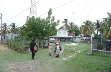 Tasia Parasram seeing her children off to school (Carl Croker photos)