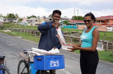 A villager as she made a purchase from Sookdeo Mahadeo