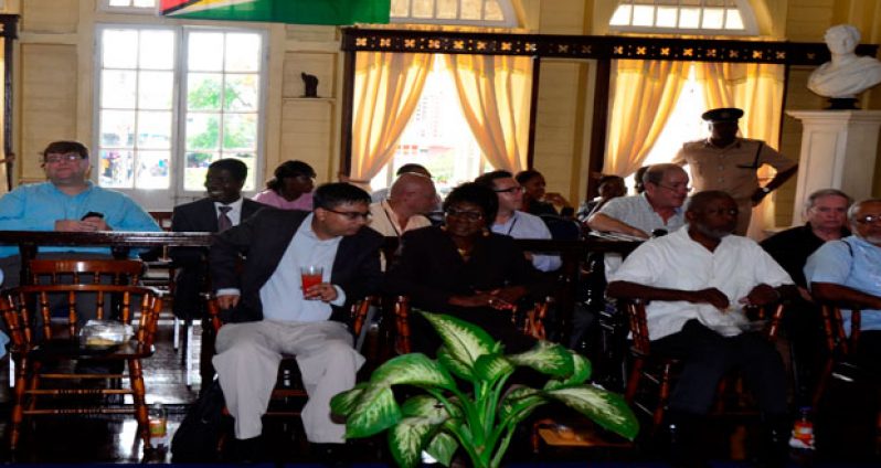 GECOM Commissioners, in front row, and members of the diplomatic corps, are seated at City Hall to observe the Nomination Day proceedings
(Photo by Adrian Narine)