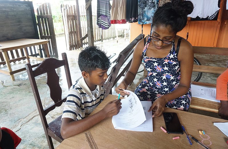 Teacher Tarmila Bhawan home-schooling the children of her community (Carl Croker photos)