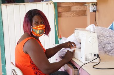 Marian London at her sewing machine