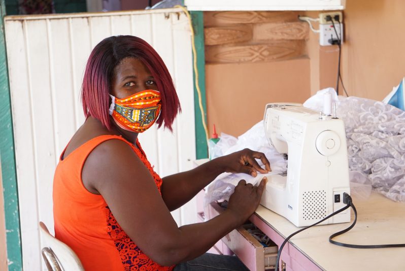 Marian London at her sewing machine