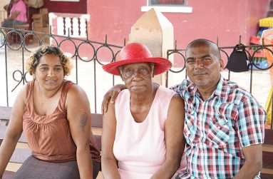 Oldest resident Edith Lynch with villagers in Pearl Village.