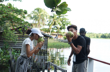Media operatives enjoying coconut water at Adel’s