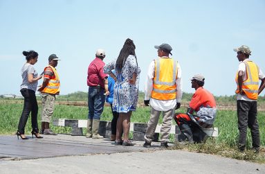 Todd shares a light moment with sugar workers at Blairmont