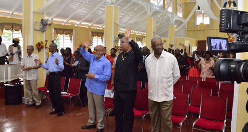 President Ramotar with, from left, APNU MP, Rupert Roopnarine, Opposition Leader, David Granger, Minister Juan Edghill and MP Odinga Lumumba at the Congregational Church in Buxton