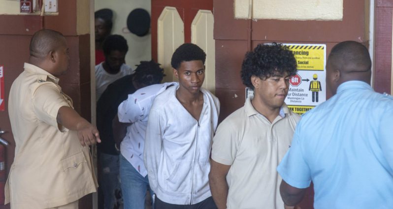 Over a dozen men appeared before Senior Magistrate Fabayo Azore on Wednesday at the Georgetown Magistrates’ Courts, facing serious charges in connection with violent protests that erupted across Georgetown earlier this week.  (Japheth Savory photos)