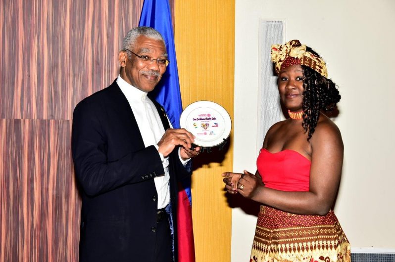 President David Granger received a special plaque from Ms. Noelle Plass as a token of appreciation for his attendance at the Gala