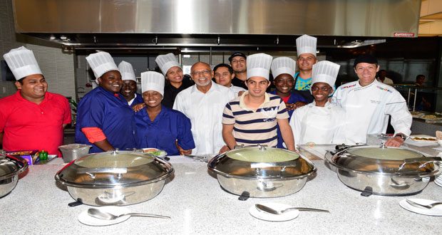 President Donald Ramotar with kitchen staff at the Marriott Hotel