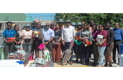 Minister of Health Dr Frank Anthony with ministry staff, RHOs, and others following the handing over  of vector-control equipment and supplies (Japeth Savory photos)