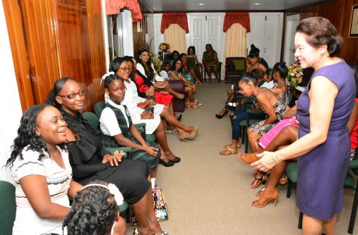 First Lady, Mrs. Sandra Granger listens as this contestant makes a point, during a meeting at State House.