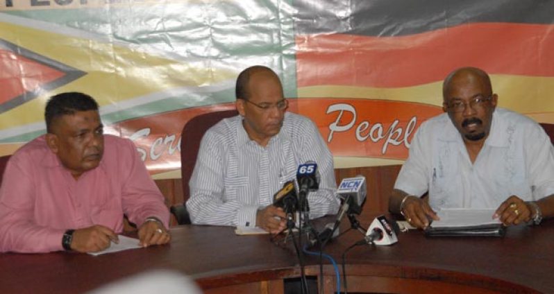 From left are Zulfikar Mustapha, Clement Rohee and Norman Whittaker