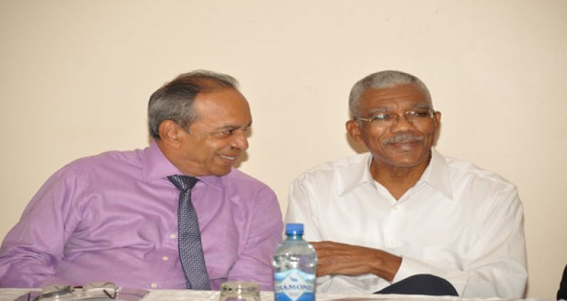 Head of State, David Granger shares a light moment with PSC Executive Member, Eddie Boyer (Delano Williams Photos)