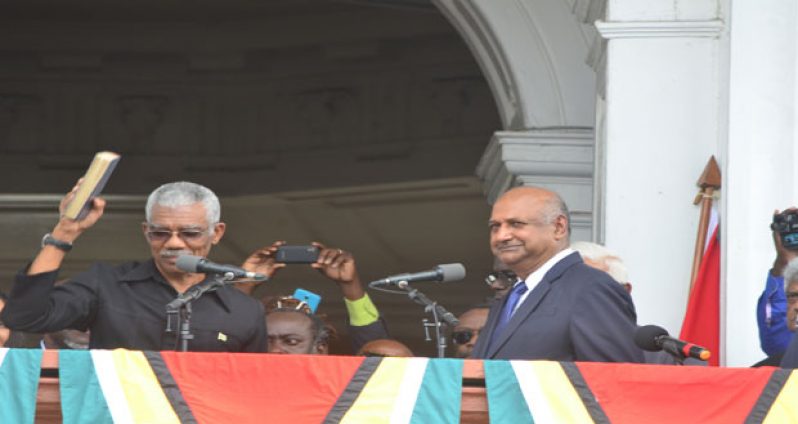 Executive President Brigadier (rtd) David Granger, with Bible in hand, after taking his Oath of Office