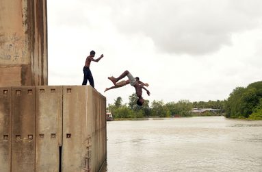 Boys having fun with a quick dip in the Berbice River
