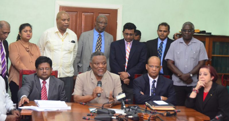 Governmanet MPs at last night's press conference. Seated from left are Finance Minister Dr. Ashni Singh, Prime Minister Samuel Hinds, Home Affairs Minister and PPP General Secretary Clement Rohee, and Government Chief Whip and Presidential Advisor on Governance Gail Teixiera. (Adrian Narine photo)