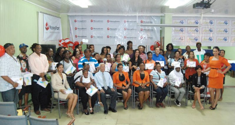 MoneyGram & SurePay promotion prize winners with officials from Neal and Massay