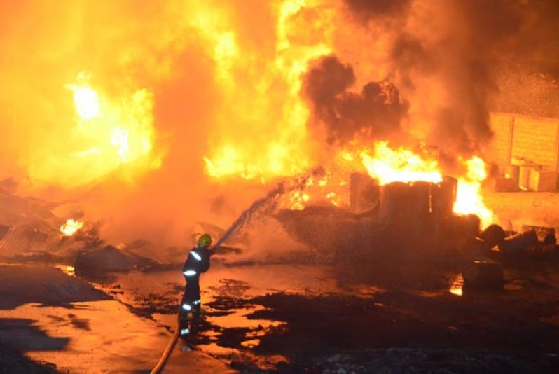 The fire at the Comfort Sleep and Payless bonds sweeps the floor of the industrial site last evening