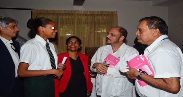 Health Minister Dr. Bheri Ramsarran with Bishops’ High School student Chelsea Edghill with CEO of the Georgetown Public Hospital Corporation Michael Khan, at right;  and UNAIDS Country Director, Dr. Roberto Campos, at left.
