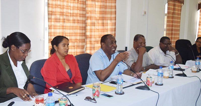 GPSU President Patrick Yarde flanked by his delegation at yesterday’s negotiations