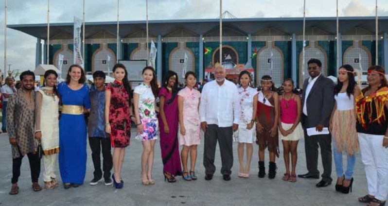 President Donald Ramotar and Minister of Tourism (ag) Irfaan Ali , 3rd from right, with Guyanese representing the nation’s ethnic mix. (Photo by Adrian Narine)