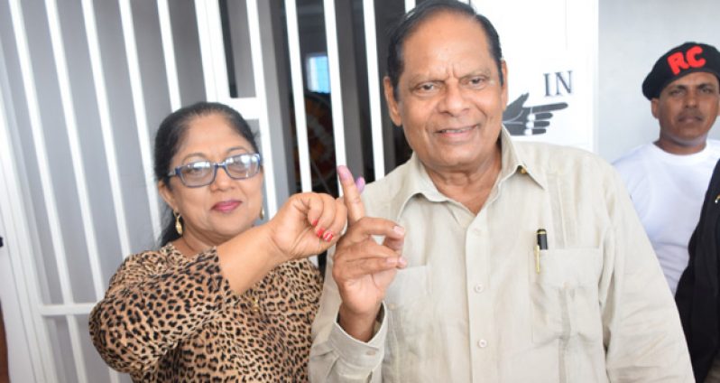 Prime Minister Moses Nagamootoo and wife, Mrs Sita Nagamootoo, proudly indicate that they have voted