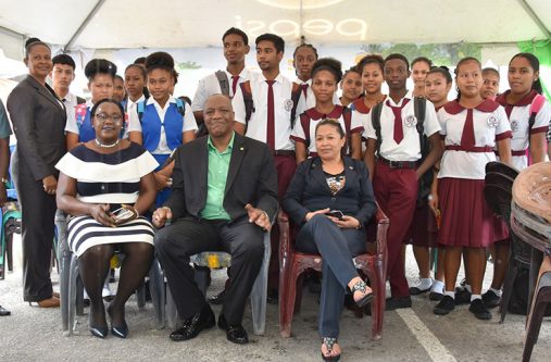 From left: Minister within the Ministry of Natural Resources, Ms. Simona Broomes, Minister of State, Mr. Joseph Harmon, Minister within the Ministry of Communities, Ms. Dawn Hastings -Williams and students of two of the Secondary schools in Bartica.