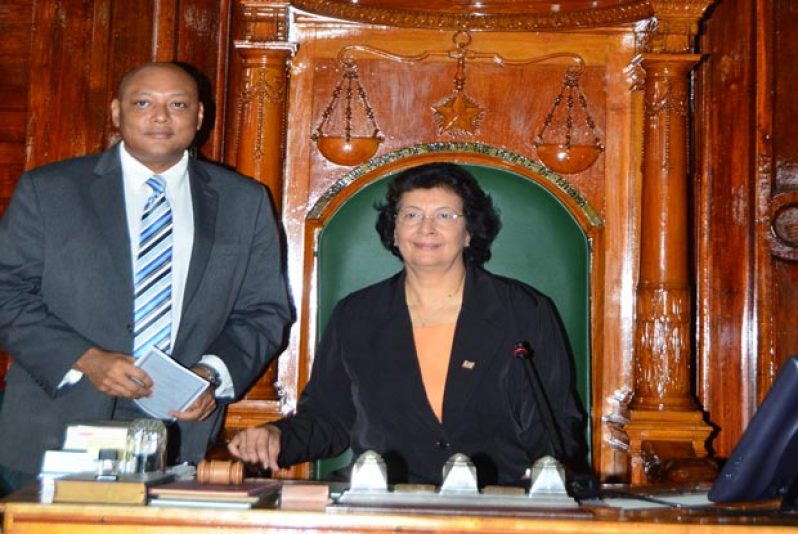 Speaker of the National Assembly of Suriname, Dr. Jennifer Geerlings-Simons sits in the Speaker’s Chair in Parliament Chambers in Georgetown. With her is Speaker Donald Trotman.