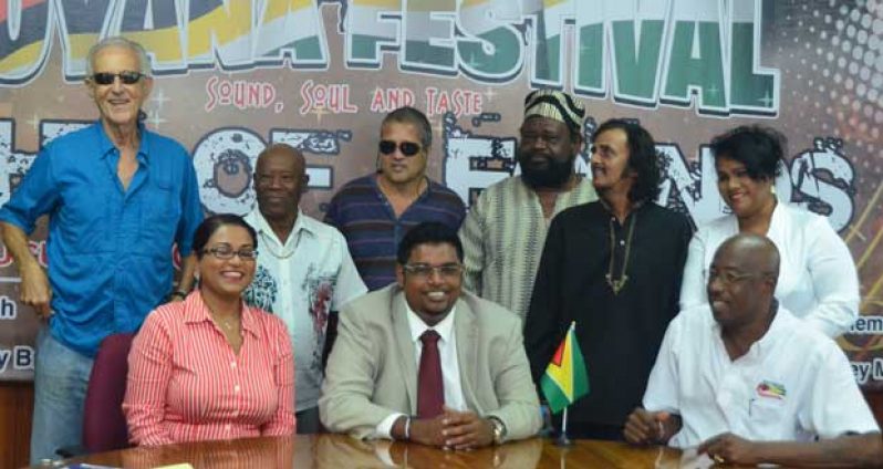 Tourism Minister, Mr Irfaan Ali (seated centre) with some of the legends at yesterday’s  launch of the event