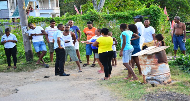 Some of the residents who were arrested speaking with  Guyana Chronicle reporter Leroy Smith on Tuesday afternoon