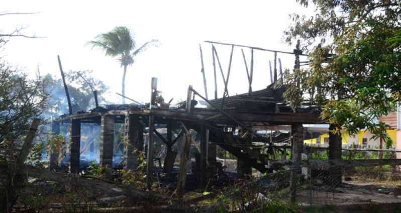 A view of what is left of the house which was destroyed by fire yesterday (Adrian Narine photo)