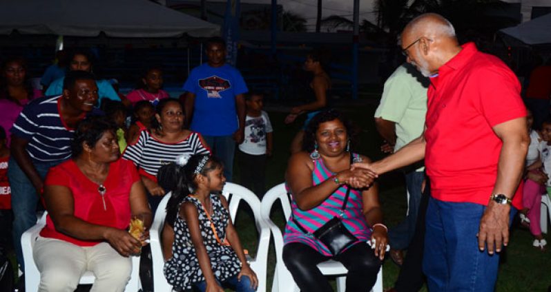 Incumbent Head of State and the PPP/C’s Presidential candidate, Donald Ramotar, interacting with members of the public at Saturday’s affair