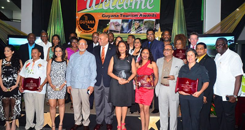 President Donald Ramotar and Tourism Minister (ag) Irfaan Ali with awardees (Adrian Narine photo)