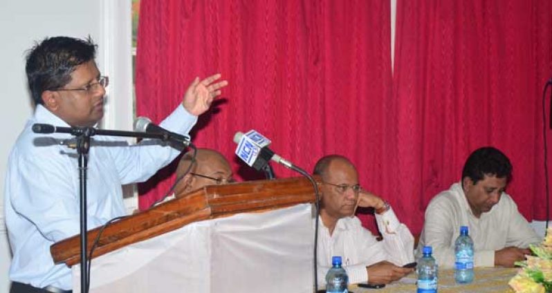 Finance Minister Dr. Ashni Singh making his presentation at last night’s inaugural symposium at the ‘Red House’ to discuss the likely impacts of Guyana’s being blacklisted (Photos by Adrian Narine)