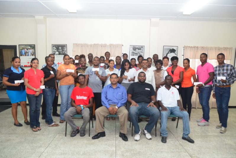 GTA Director, Mr. Indranauth Haralsingh (seated centre)with the newly-certified first aid and CPR-trained hotel staff (Photo by Adrian Narine)