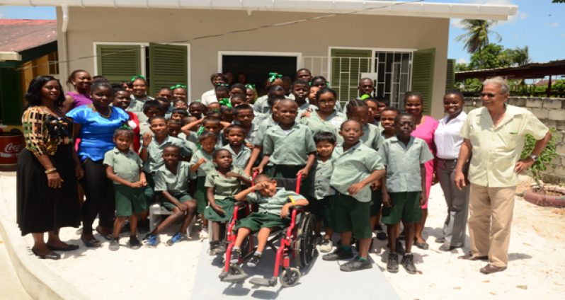 Minister Roopnaraine sharing a moment with the students and teachers of the Diamond Special Needs School