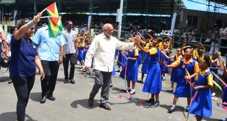 President of Guyana, Donald Ramotar and Education Minister Priya Manickchand during their walk around and interaction with the students (Adrian Narine photo)