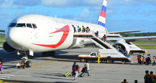 Dynamic Airways boarding passengers at the CJIA recently