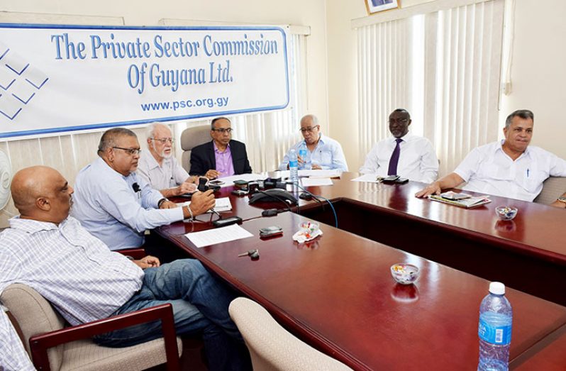 PSC Chairman Edward Boyer(centre) flanked by members of the commission