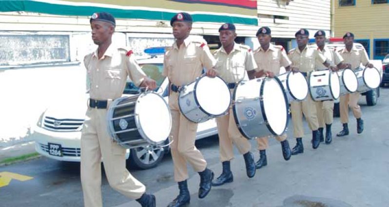 Ranks from the TSU march off with the drums which were assembled for the traditional Drum Head Service yesterday morning.