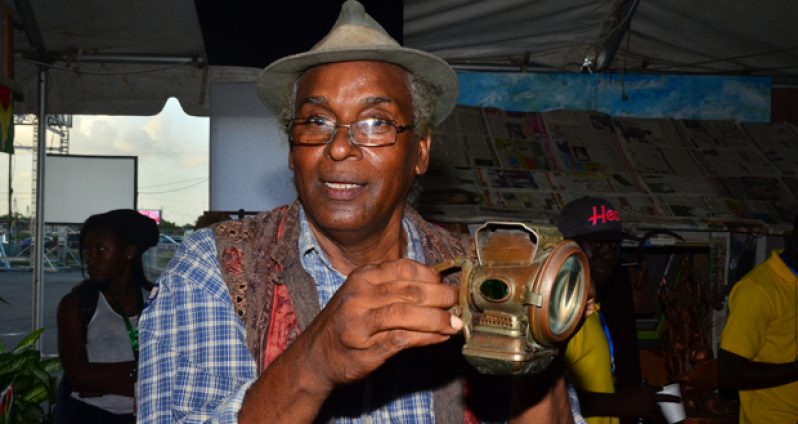 Michael Khan with the pork-knocker’s lamp